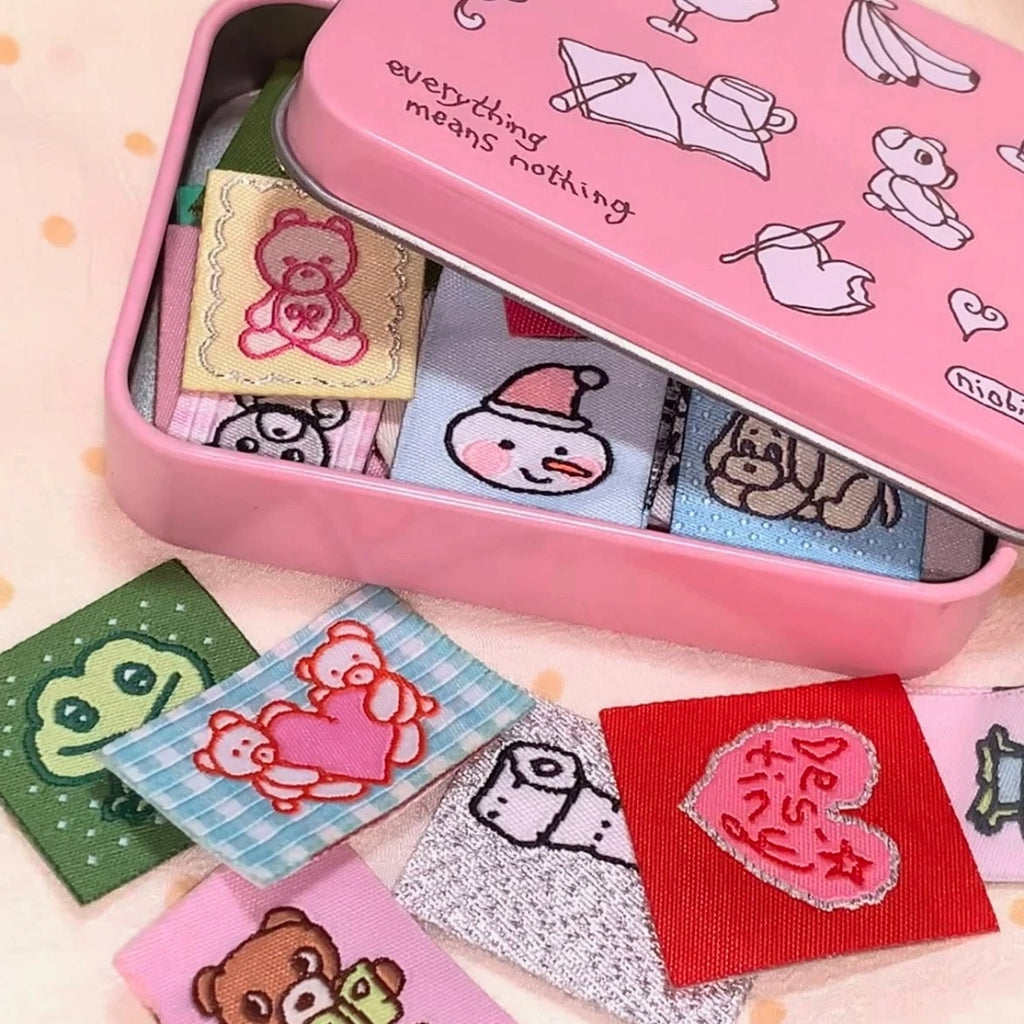 NIO BIUM - FABRIC STICKER PACK WITH TIN
