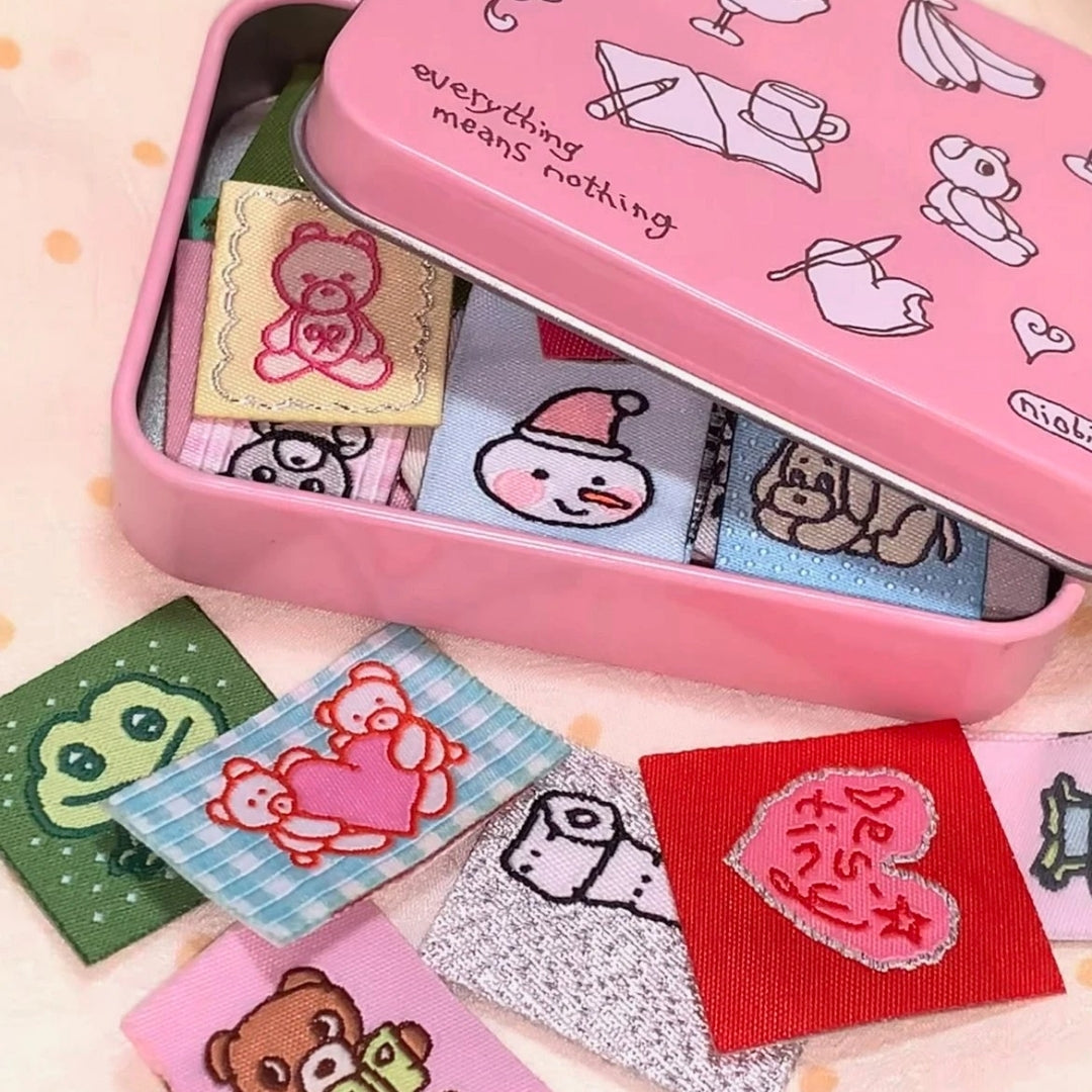NIO BIUM - FABRIC STICKER PACK WITH TIN